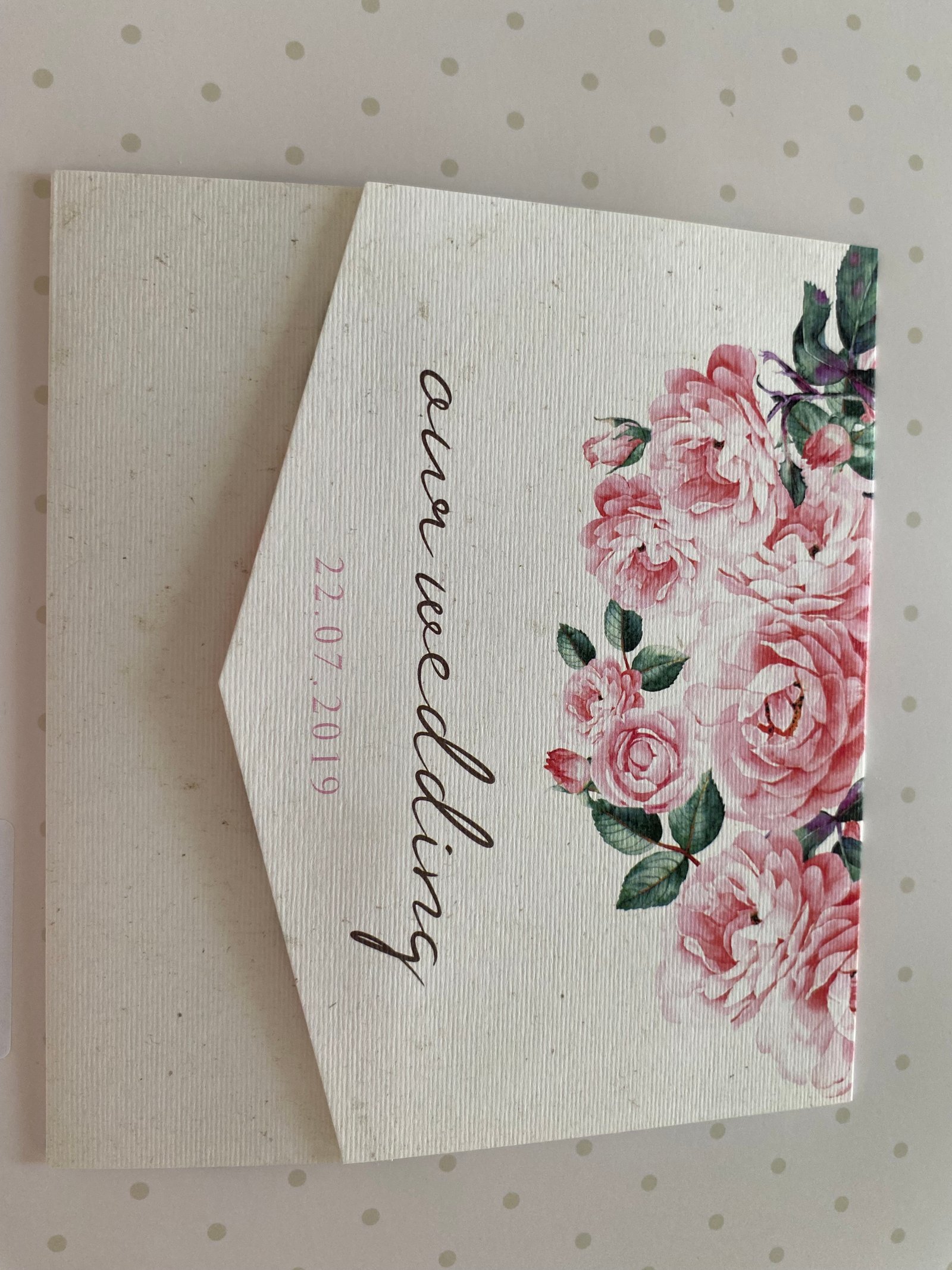 Wedding invitation with pink flowers