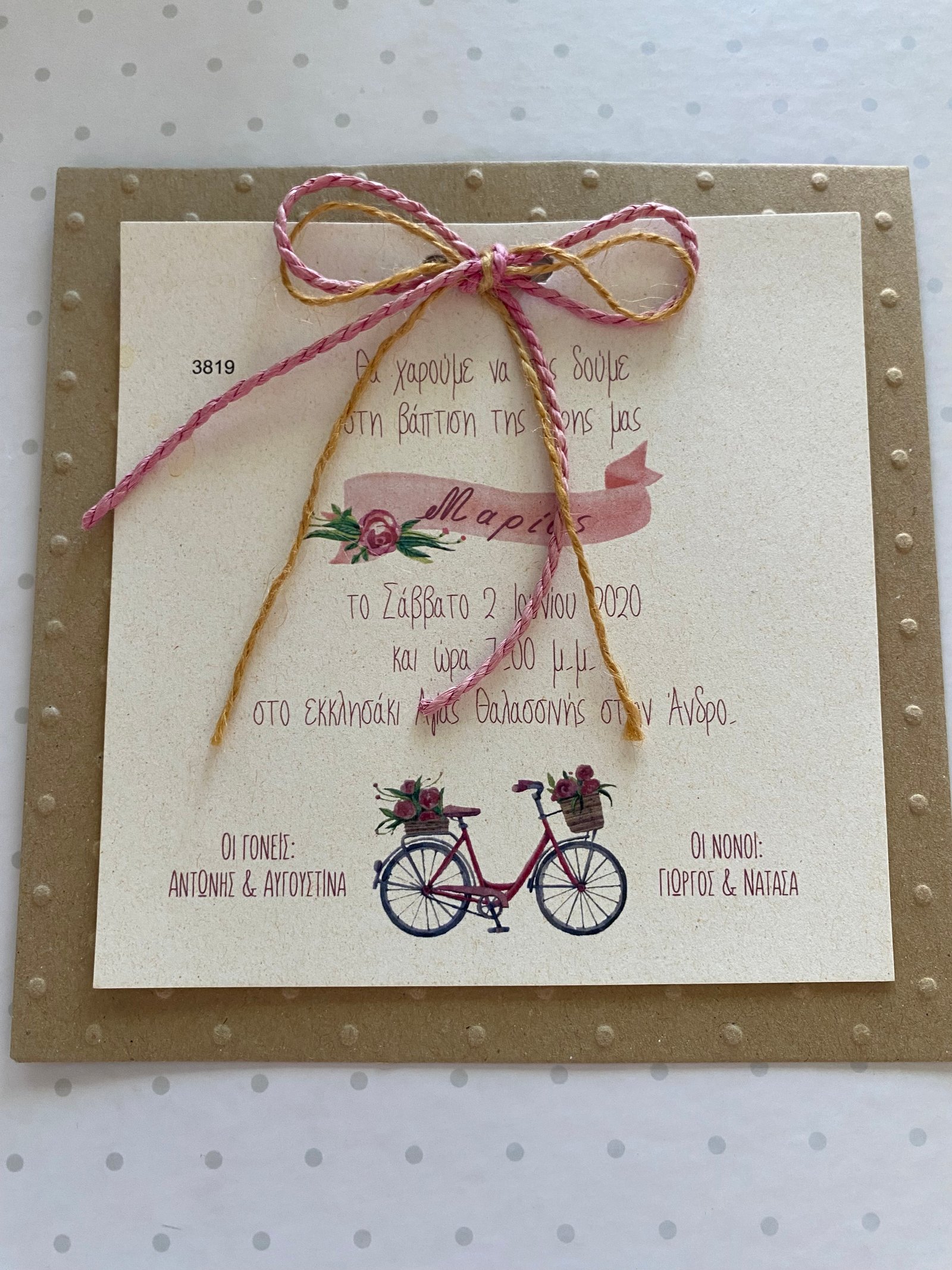 Christening invitation with a pink envelope
