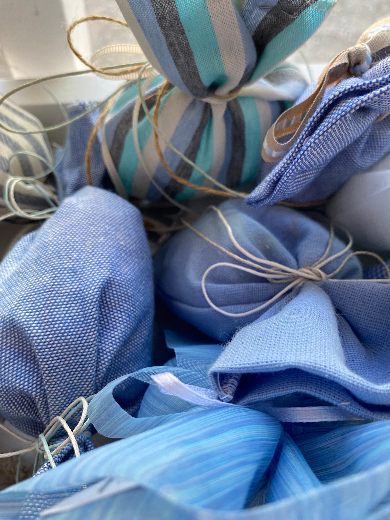 Christening favors in different fabrics